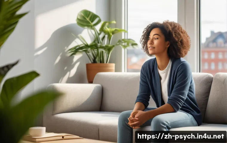 심리학의 심리치료 - A calm and modern therapy room setting showing a diverse young adult woman sitting comfortably on a ...